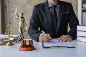 The closeup of the torso of a personal injury lawyer. 